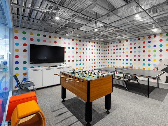 open ceiling with bright task lighting over play space