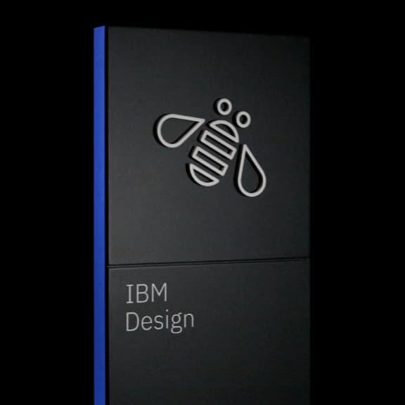 IBM bee on back painted wall sign