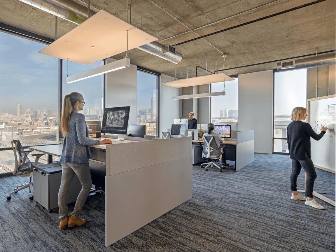 open ceiling with pendant lighting over work space