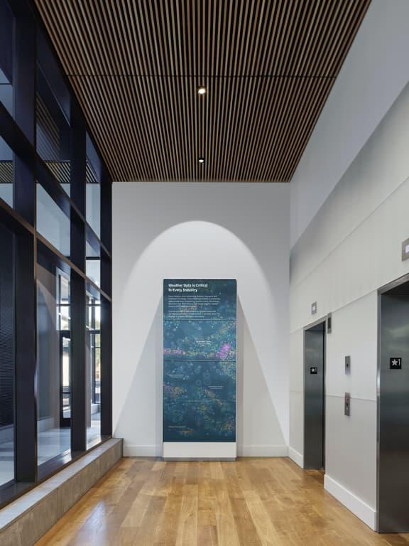 wood slat ceiling in elevator lobby