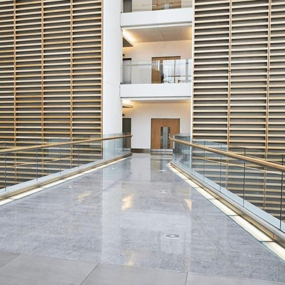 flooring and ceiling in arrival zone