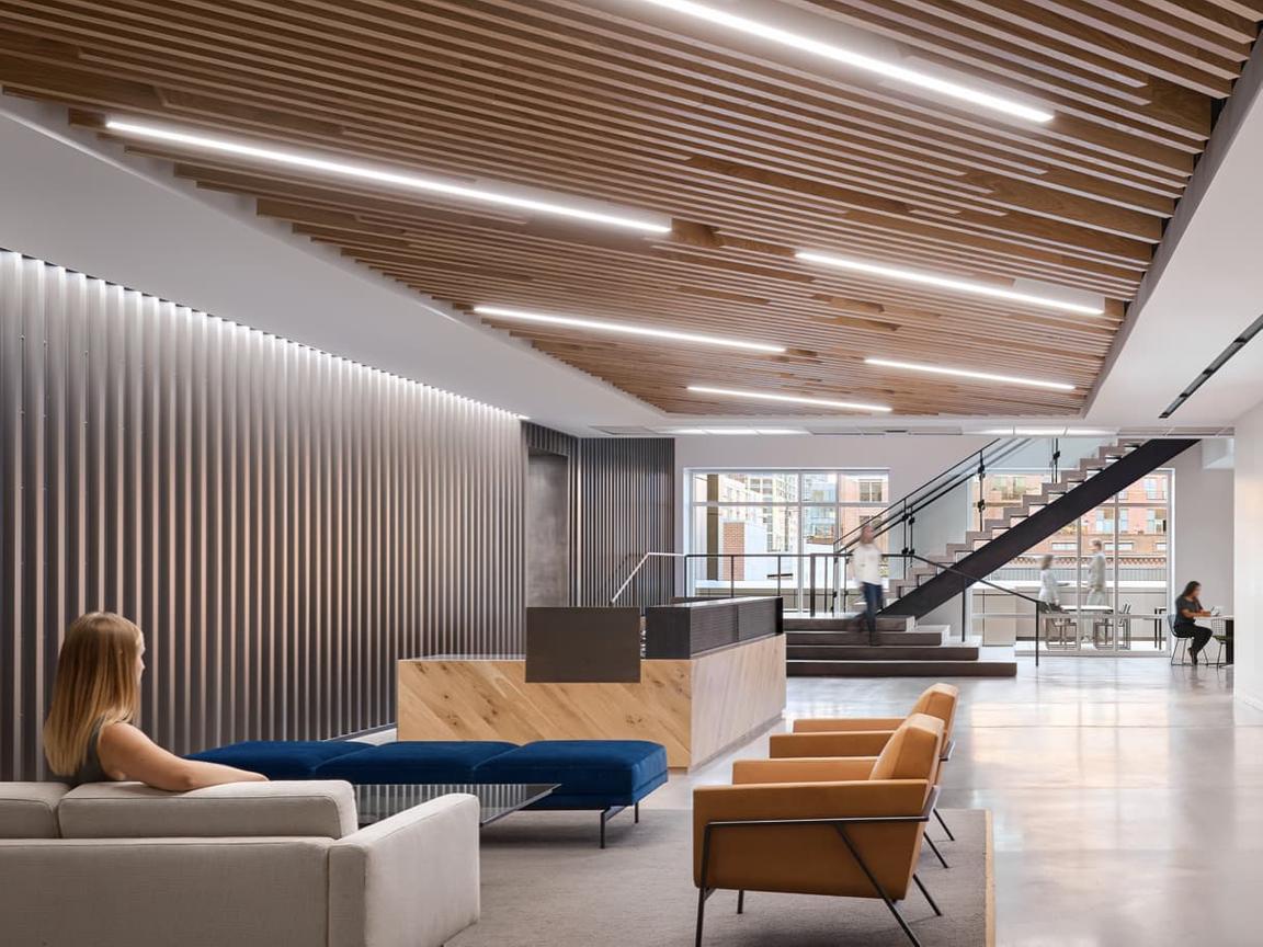 linear fixtures echo lines of wood slat ceiling