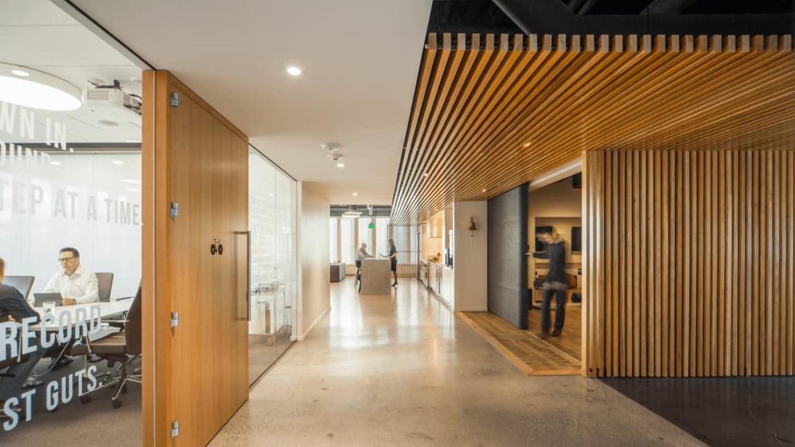 concrete flooring with finished and slat ceiling